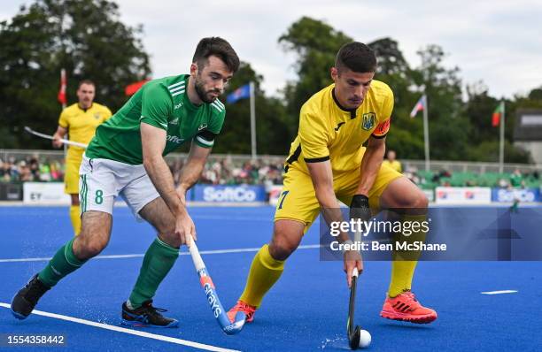 Dublin , Ireland - 25 July 2023; Dmytro Luppa of Ukraine in action against John McKee of Ireland during the Men's EuroHockey Championship Qualifier...