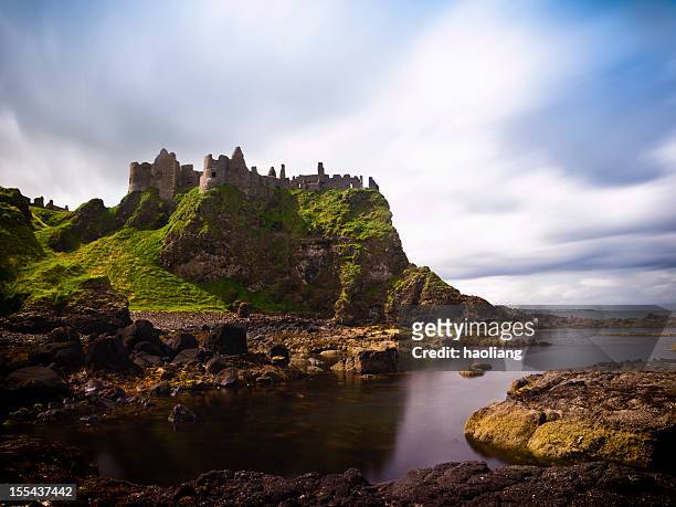 dunluce castle - irish sea stock pictures, royalty-free photos & images