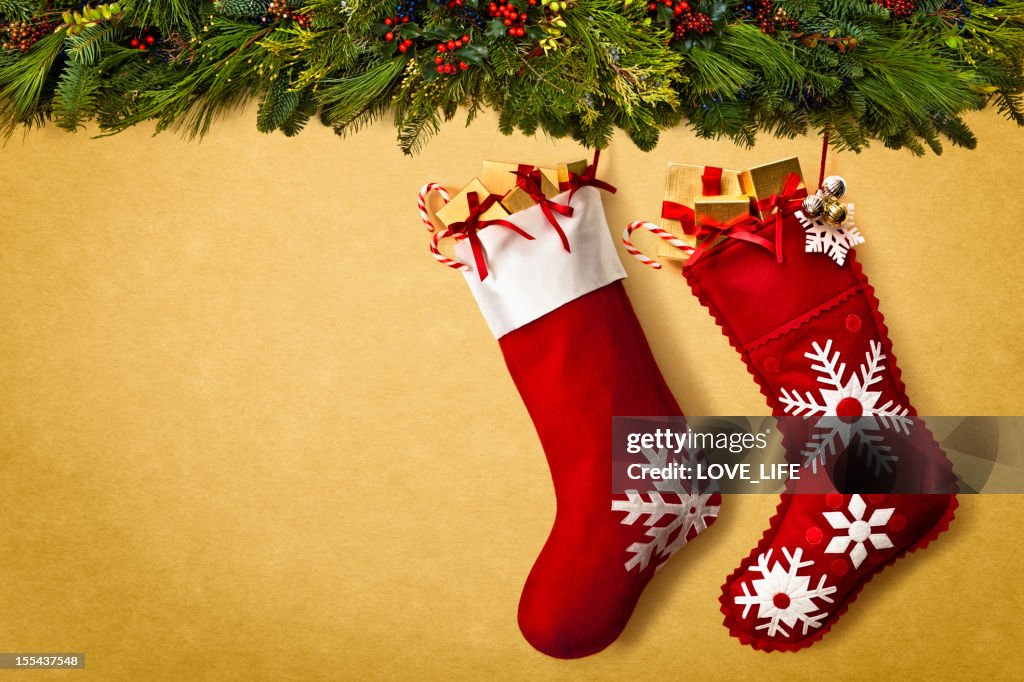 Christmas stockings hanging from garland