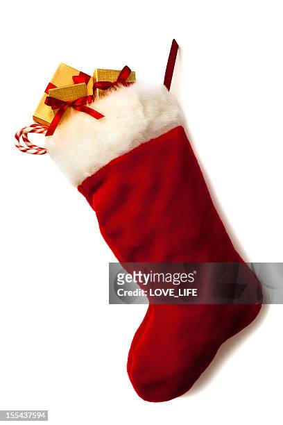 weihnachtsstrumpf und blumenkranz - christmas stockings stock-fotos und bilder