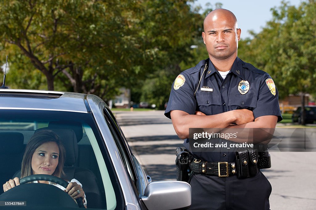 African American Police Officer Making Traffic Stop