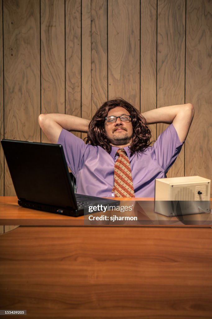 Relaxed Computer User Relaxed Computer It Guy Chilling At His Desk In Office High-Res Stock ...