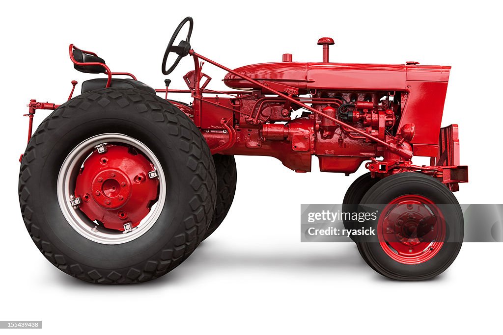 Vintage Red Farm Tractor in Profile with Clipping Path Isolated
