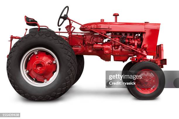 vintage red farm tractor in profile with clipping path isolated - tractor stock pictures, royalty-free photos & images