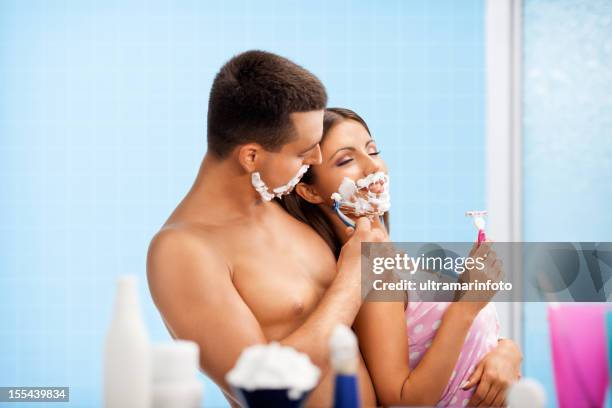 handsome man shaving beautiful woman - head shave woman stock pictures, royalty-free photos & images