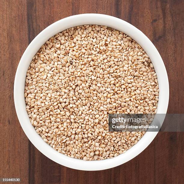 whole grain sesame seeds - sesamfrö bildbanksfoton och bilder