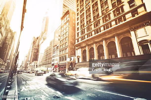 fast cars on the streets of new york city - manhattan new york city stock pictures, royalty-free photos & images