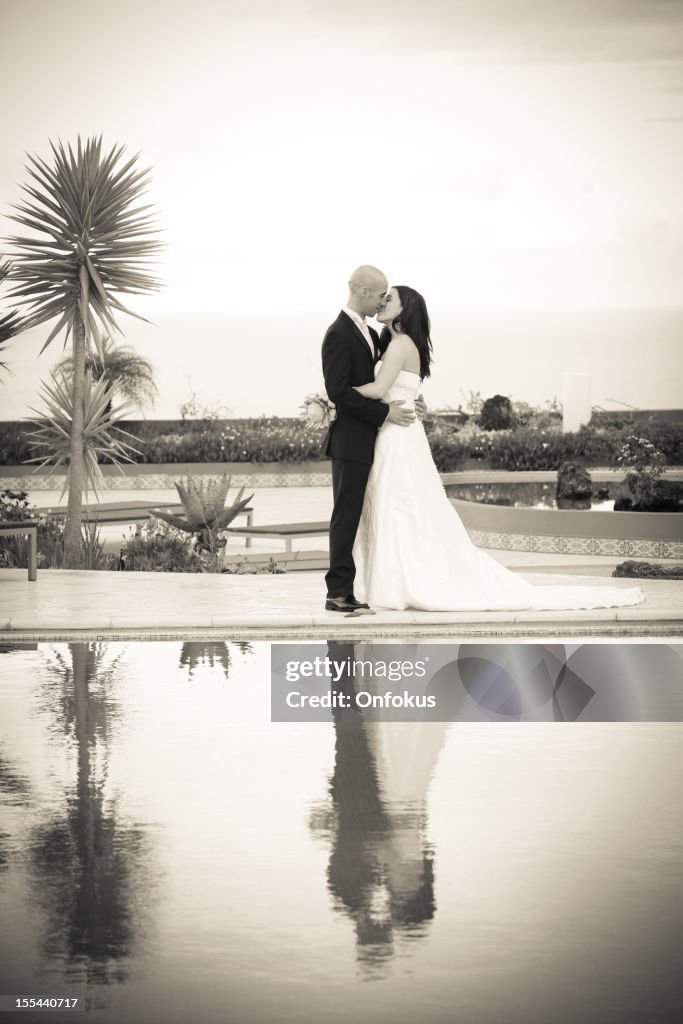 Romantic and attractive newly wed couple (black and white)