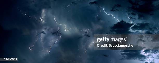 thunderstorm cloudscape - dramatic night sky stock pictures, royalty-free photos & images