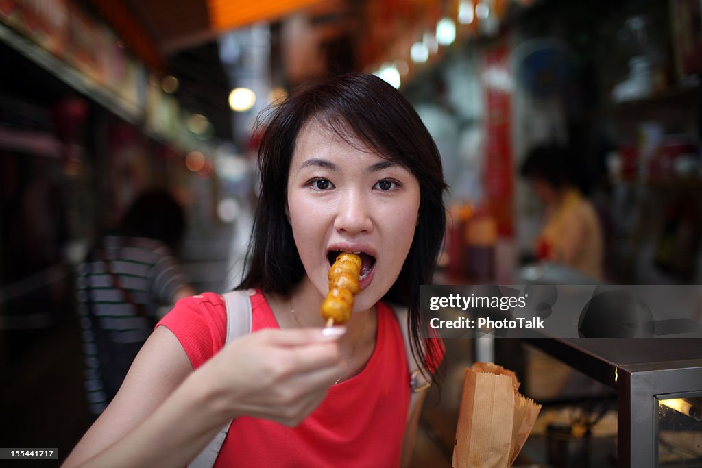 Woman Eating Delicious Fish Balls - XXXLarge