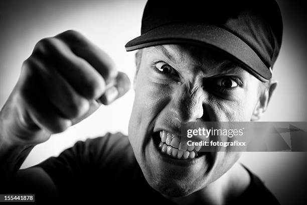 angry white man punching - security issues stock pictures, royalty-free photos & images