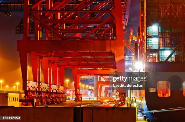 container crane and ship - overhead crane stock pictures, royalty-free photos & images