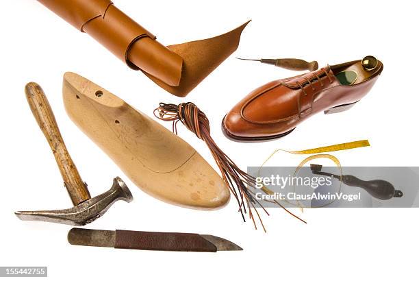 hand made shoes and tools - tracery stockfoto's en -beelden