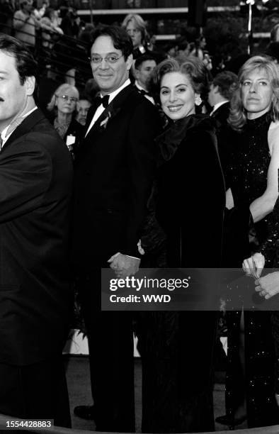 Actors Raul Julia and Merel Poloway attend the 65th Annual Academy Awards at the Shrine Auditorium on March 29 in Los Angeles, CA.
