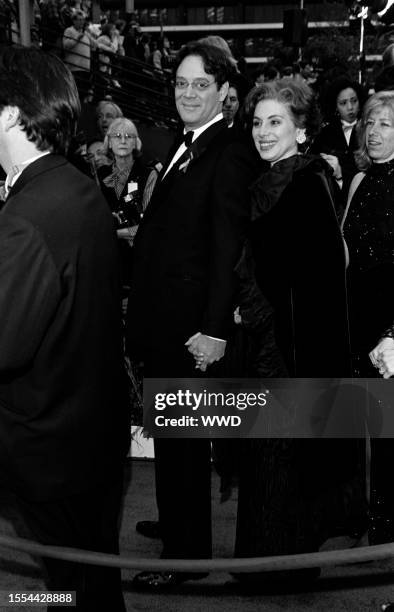 Actors Raul Julia and Merel Poloway attend the 65th Annual Academy Awards at the Shrine Auditorium on March 29 in Los Angeles, CA.