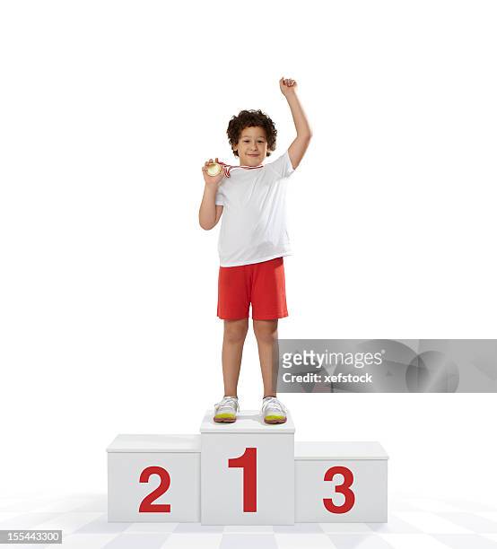 rewarding of the winner - winners podium stock pictures, royalty-free photos & images