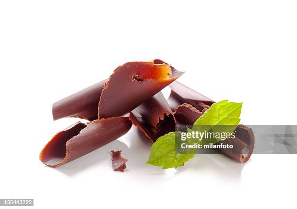 chocolate curls with mint - chocolate chunks on white stock pictures, royalty-free photos & images