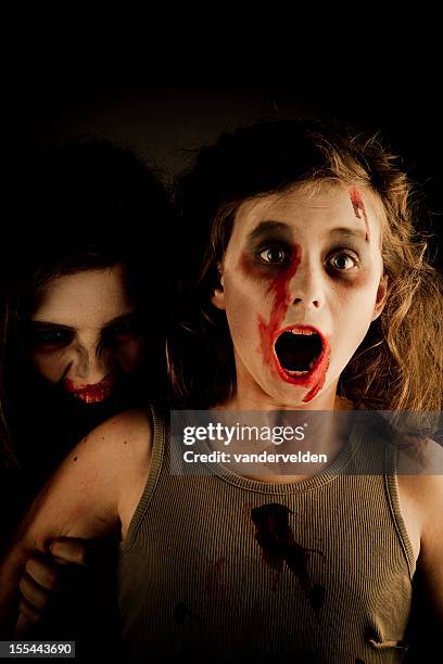 zombie sisters - zombie face stock-fotos und bilder