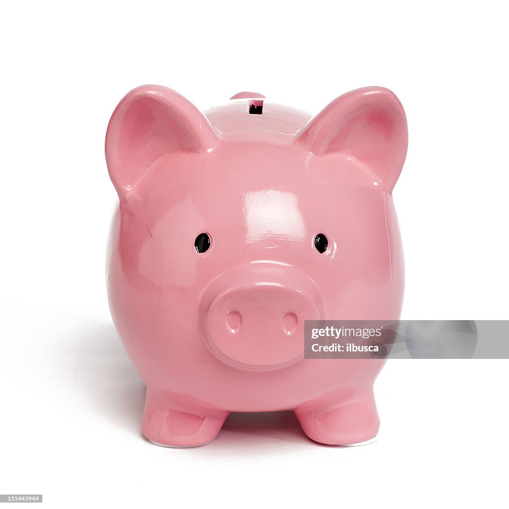 Pink piggy bank isolated on white