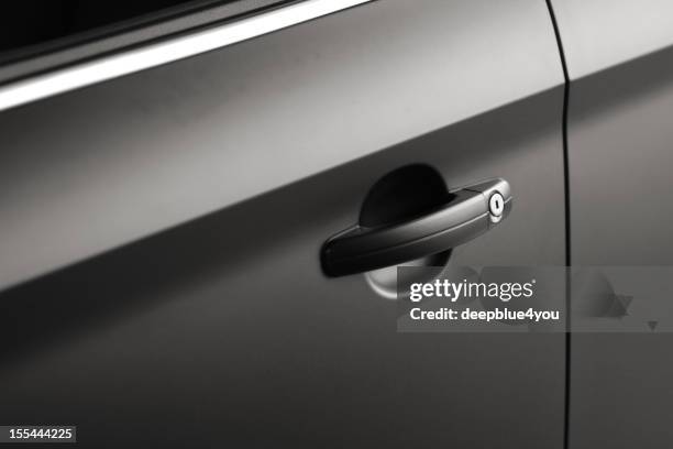 black car doorhandle close up - open car door stock pictures, royalty-free photos & images