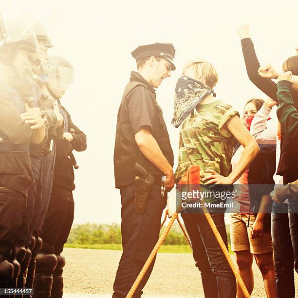 confrontation - police confrontation stock pictures, royalty-free photos & images