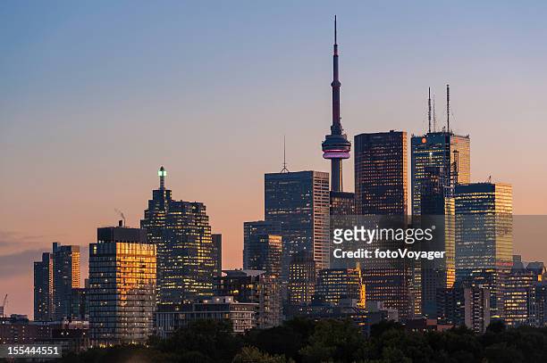 toronto downtown skyscraper skyline sunset - toronto stock pictures, royalty-free photos & images