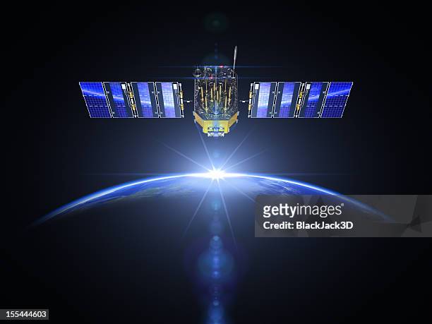 satellite and sunrise in space - satellite image stockfoto's en -beelden
