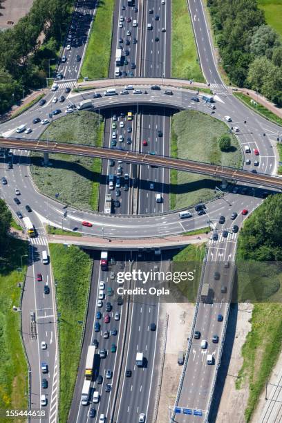 aerial shot of highway interchange - netherlands aerial stock pictures, royalty-free photos & images