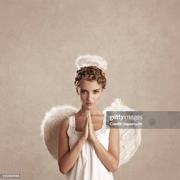 prier angel - halo photos et images de collection