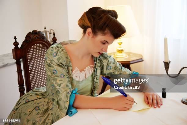 victorian woman writing a letter - quill pen stock pictures, royalty-free photos & images
