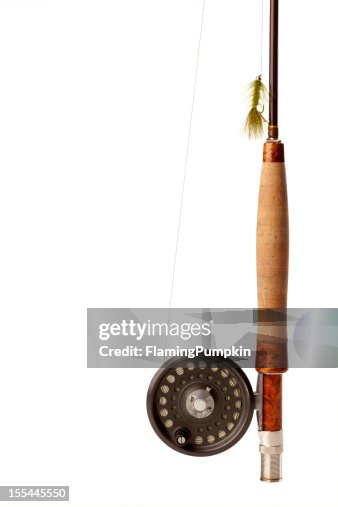 Fly-Fishing Rod & Reel on White Background. Copy Space. Fly-Fishing Rod & Reel on White Background. Copy Space.