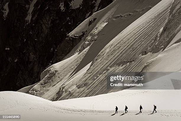 mountain climbers - mountain ridge stock pictures, royalty-free photos & images