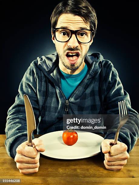 Tighten Funny Photos and Premium High Res Pictures - Getty Images