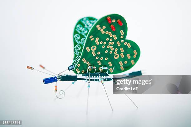 electronic butterfly - butterfly isolated stock pictures, royalty-free photos & images