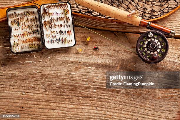 close up, fly-fishing rod &amp; collection of flies, copy space. - hook equipment stock pictures, royalty-free photos & images