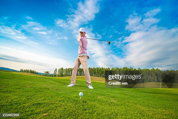 golfer in backswing with driver - driving range 個照片及圖片檔