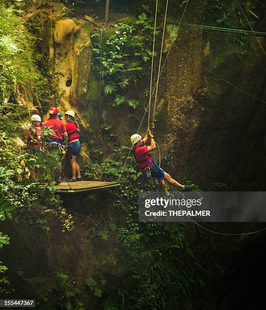 tarzan swing lines in costa rica - costa rica zipline stock pictures, royalty-free photos & images