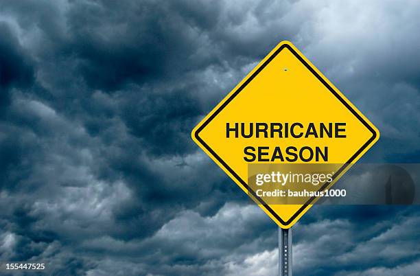 hurricane season road sign - hurricane stock pictures, royalty-free photos & images