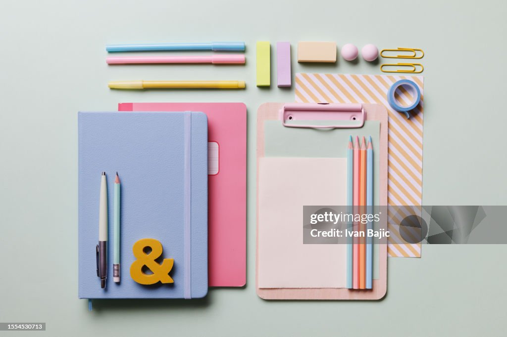 Office table with colorful supplies
