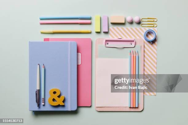 office table with colorful supplies - kontorstillbehör bildbanksfoton och bilder