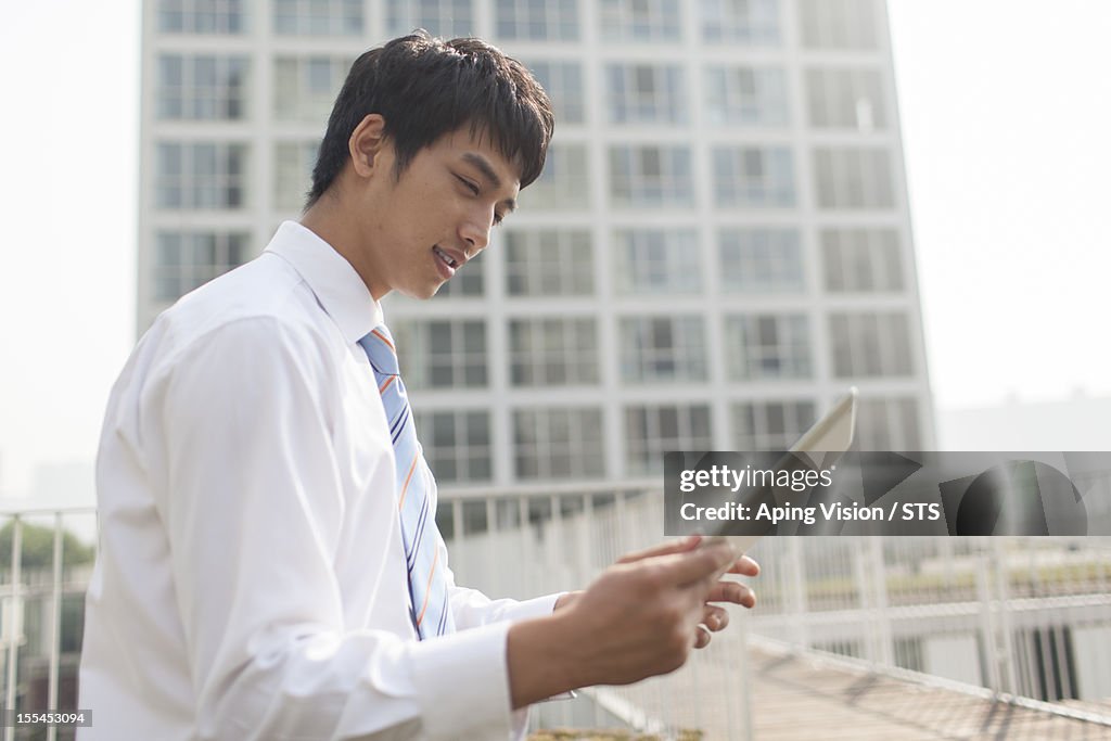 Businessman with digital tablet