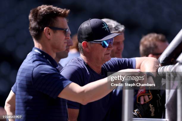 General manager Jerry Dipoto of the Seattle Mariners watches batting practice with manager Scott Servais at T-Mobile Park on July 18, 2023 in...