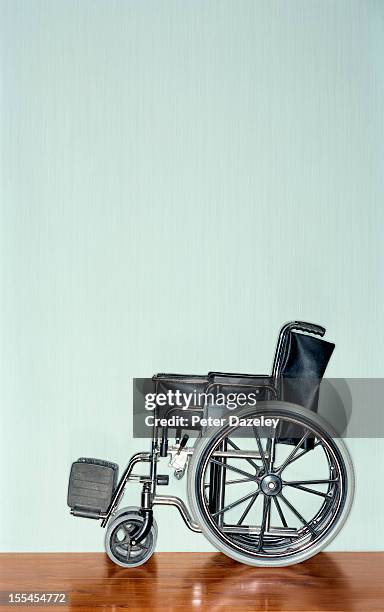 wheelchair with copy space - 車いす　無人 ストックフォトと画像