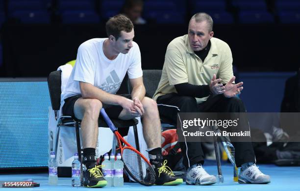 Andy Murray of Great Britain with his coach Ivan Lendl as they discuss tatics during a practice session prior to the start of ATP World Tour Finals...