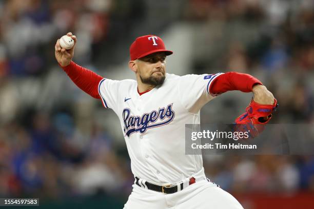 Nathan Eovaldi of the Texas Rangers throws a pitch in the third inning against the Tampa Bay Rays at Globe Life Field on July 18, 2023 in Arlington,...
