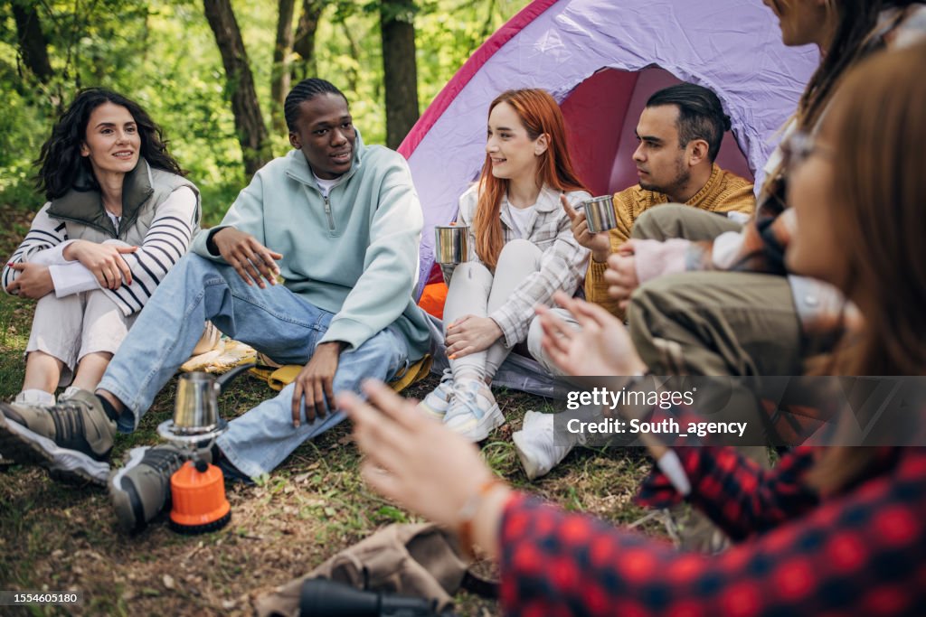 Friends Camping In Nature High Res Stock Photo Getty Images friends-camping-in-nature-high-res-stock-photo-getty-images