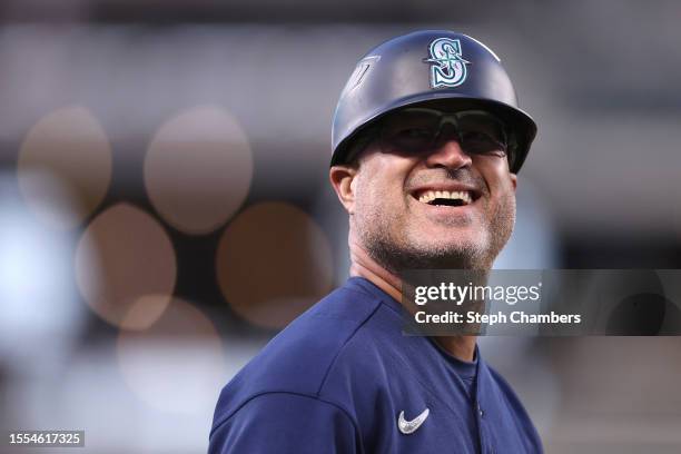 Third base coach Manny Acta of the Seattle Mariners looks on during the game against the Minnesota Twins at T-Mobile Park on July 17, 2023 in...