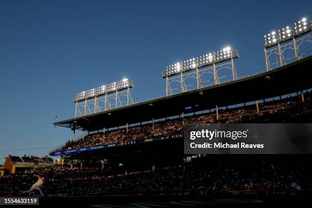 Jameson Taillon of the Chicago Cubs delivers a pitch during the second inning against the Washington Nationals at Wrigley Field on July 18, 2023 in...