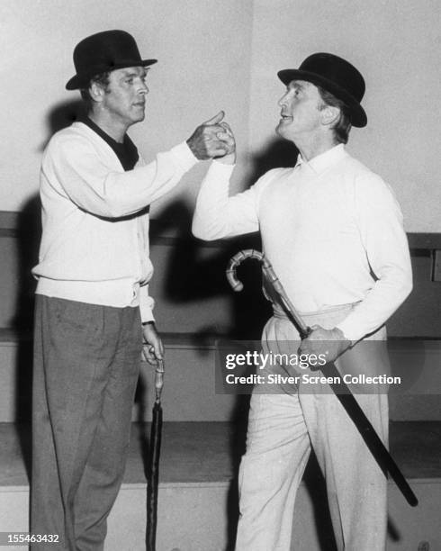 American actors Burt Lancaster and Kirk Douglas rehearse a song and dance act in preparation for 'Night of 100 Stars' charity benefit at the London...