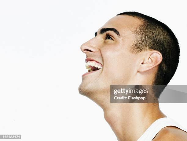 portrait of man smiling - 横顔　男性 ストックフォトと画像